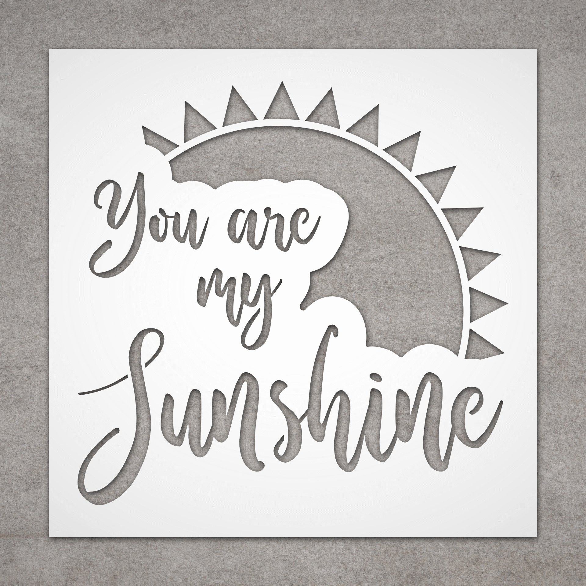 Stencil that says “you are my sunshine“ and has sun behind it