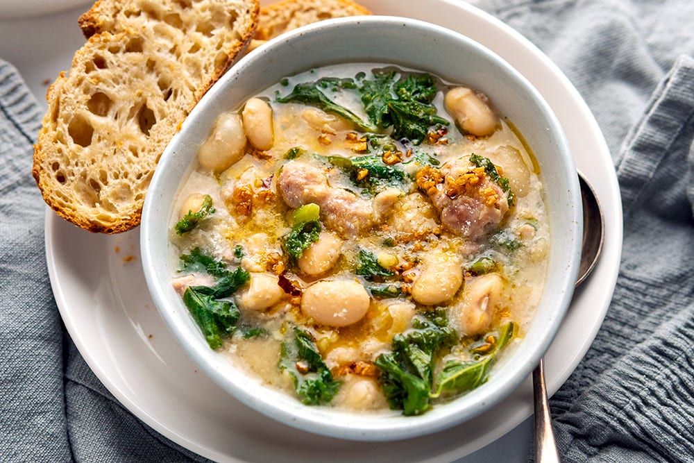 Kale, Sausage & White Bean Stew With Chili Oil